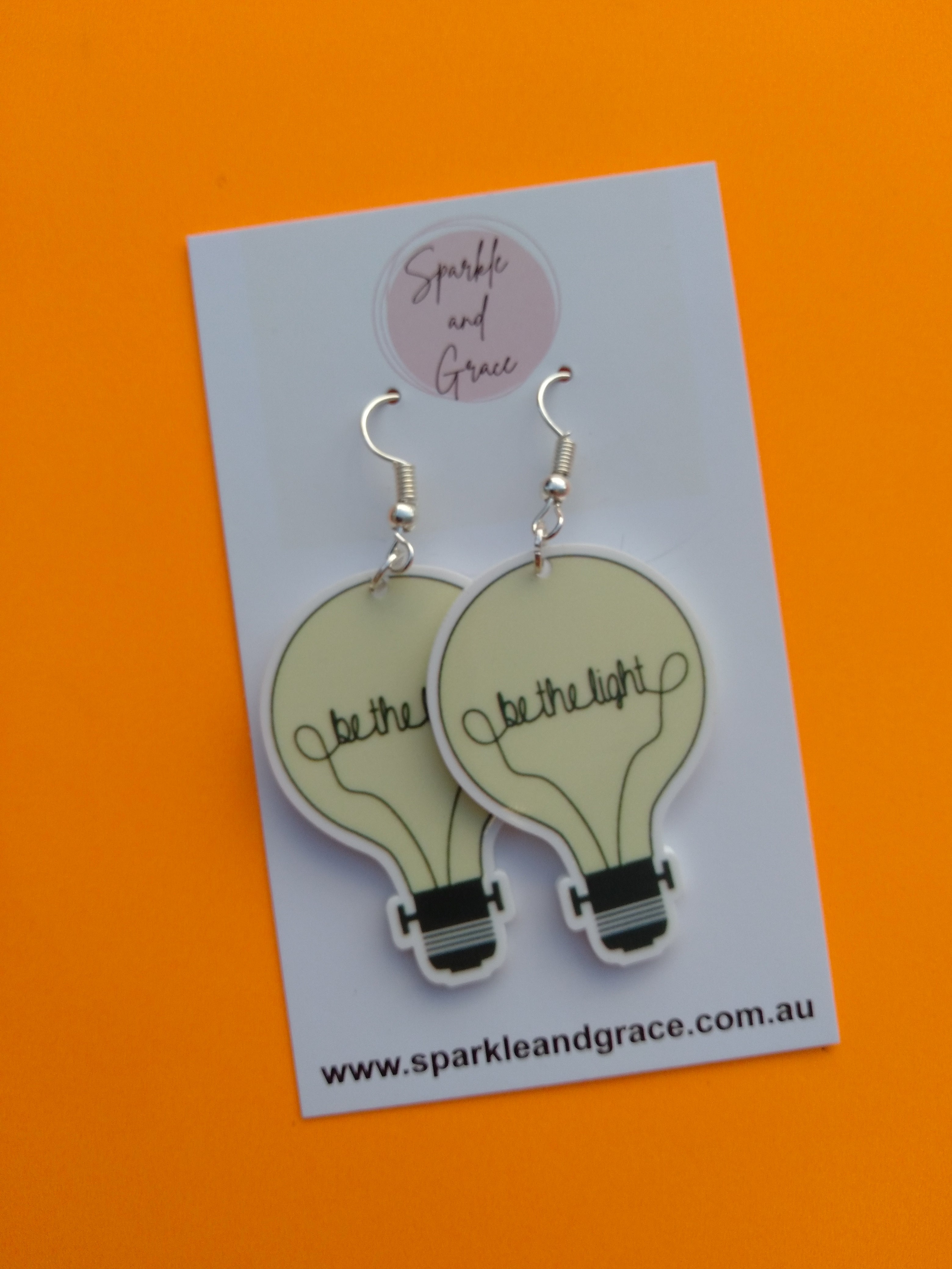 Light shop dangle earrings